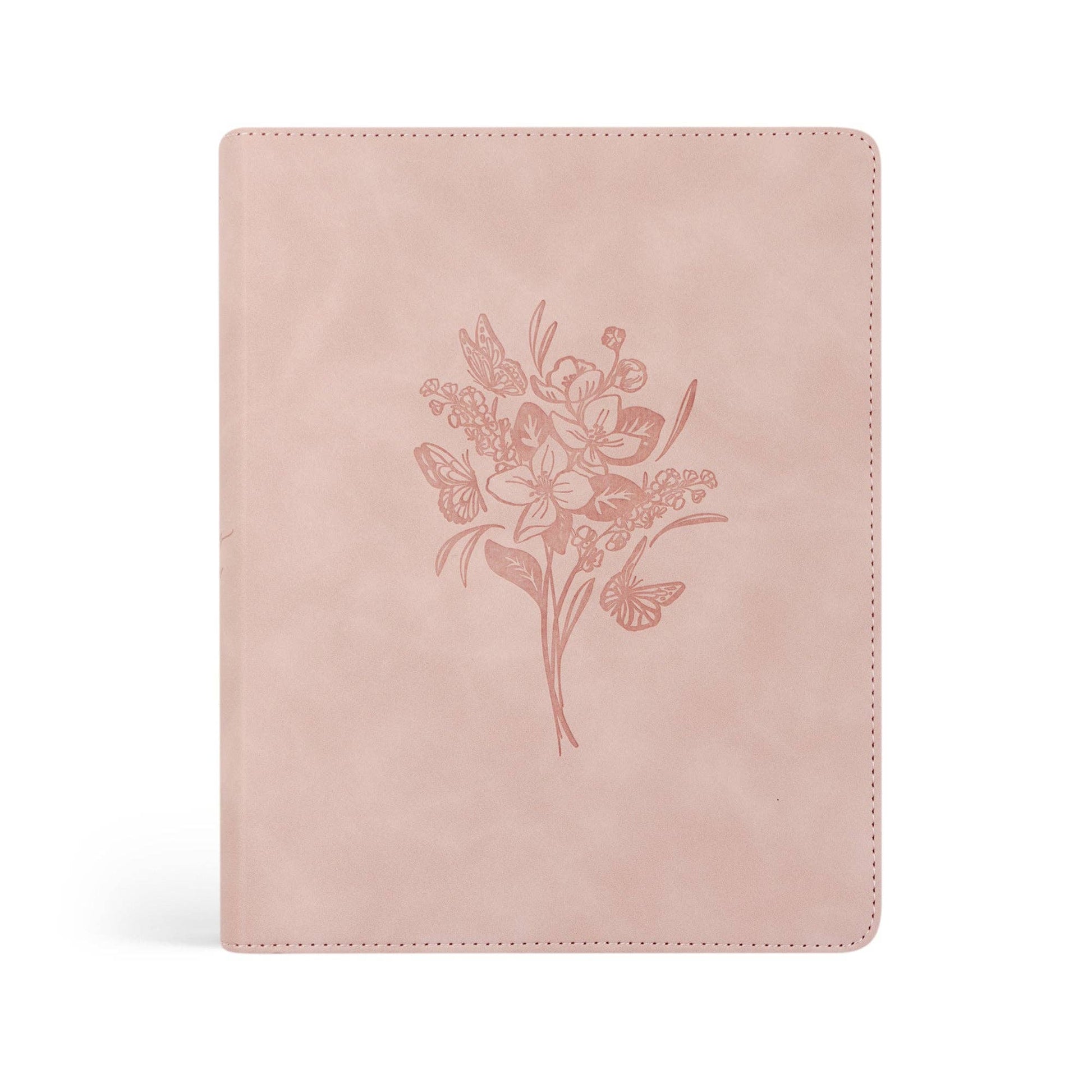 Pink bible with floral design on a white background
